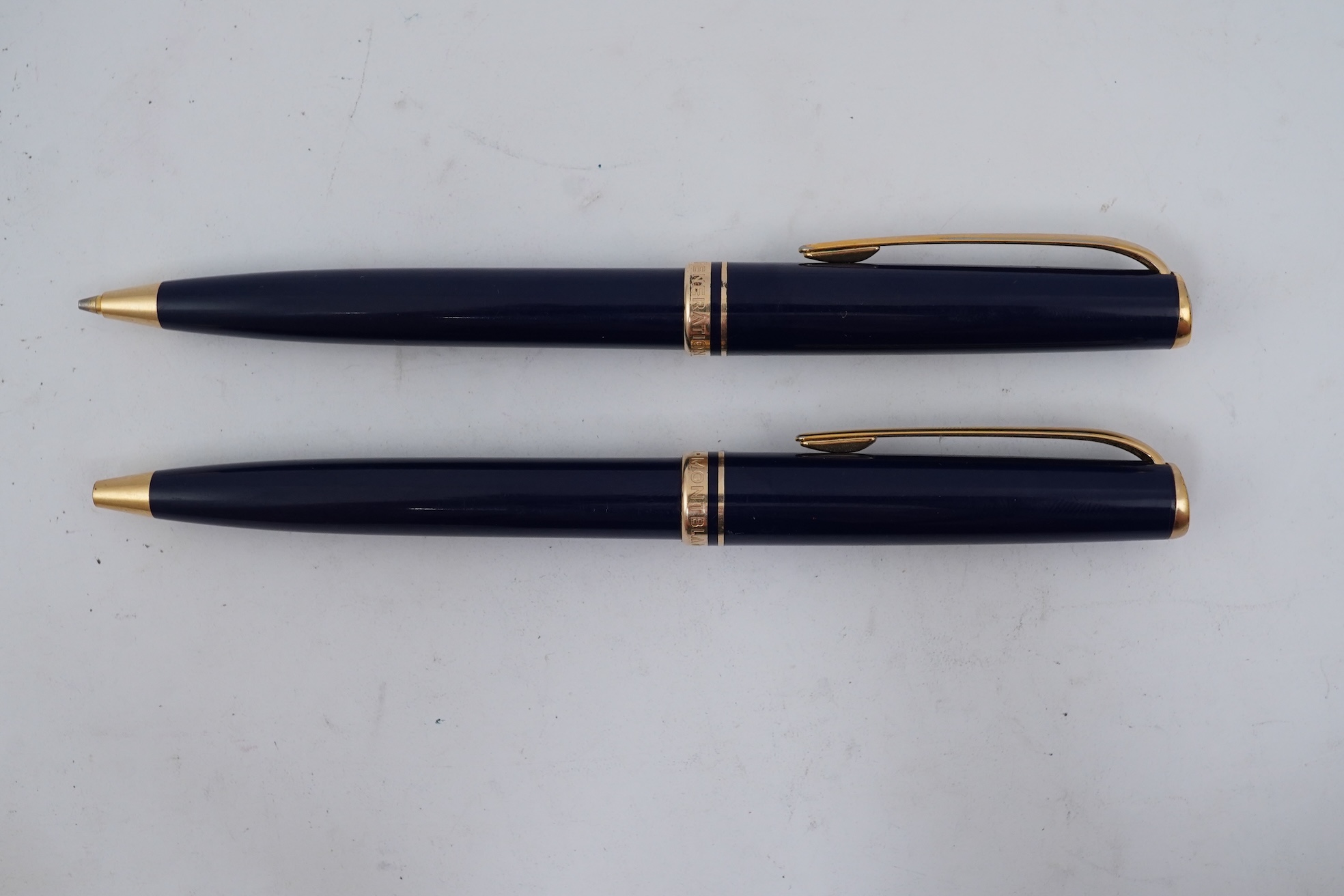 A Montblanc Generation ballpoint pen and propelling pencil set in blue with gold trims